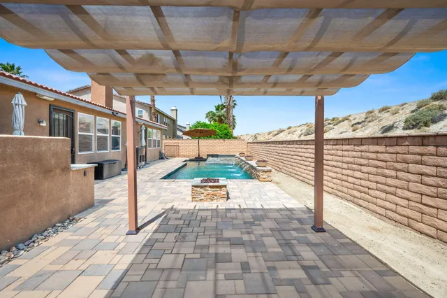 a view of a balcony with a potted plant