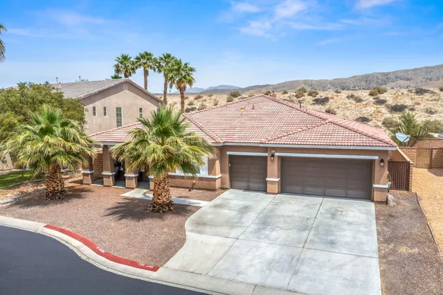 front view of house with a garden