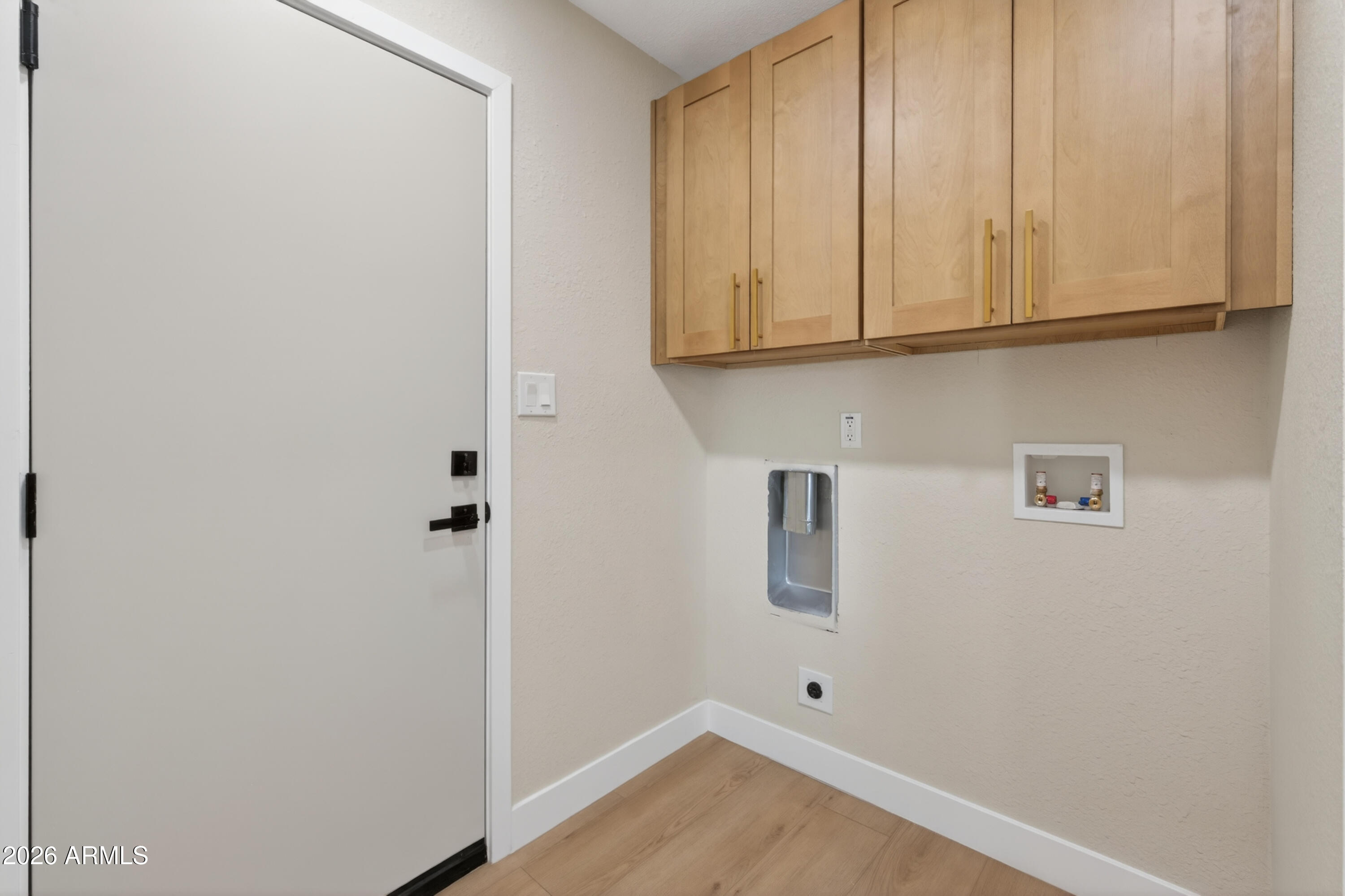 3422 South Terrace Road Tempe, AZ 85282 - Photo 29 of 43 a view of storage and utility room with wooden floor