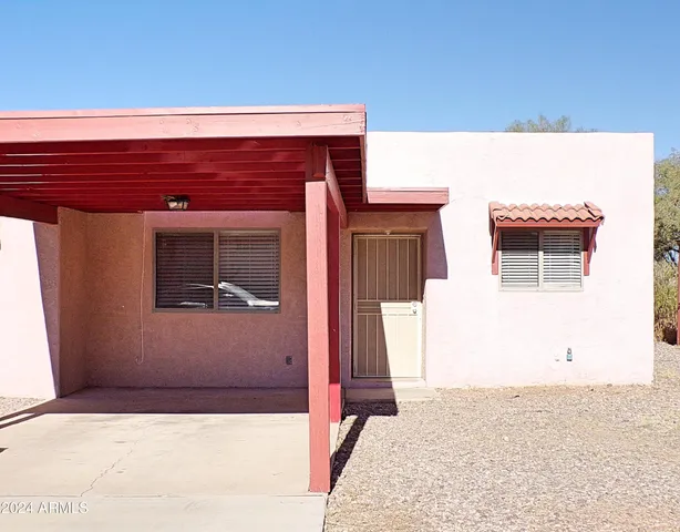 a view of an empty room and closet