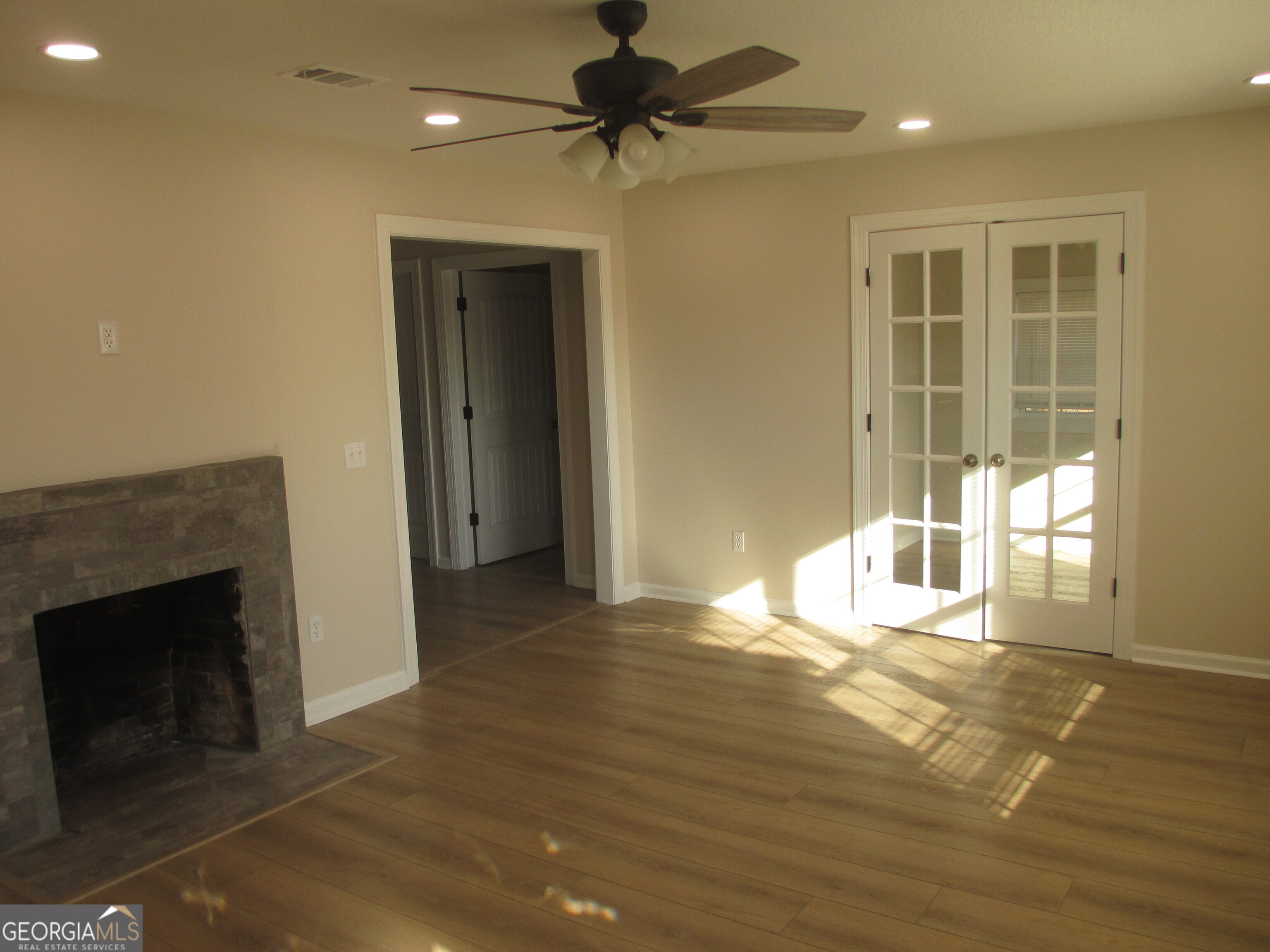 390 Bay Street Baxley, GA 31513 - Photo 8 of 24 a view of a livingroom with a fireplace