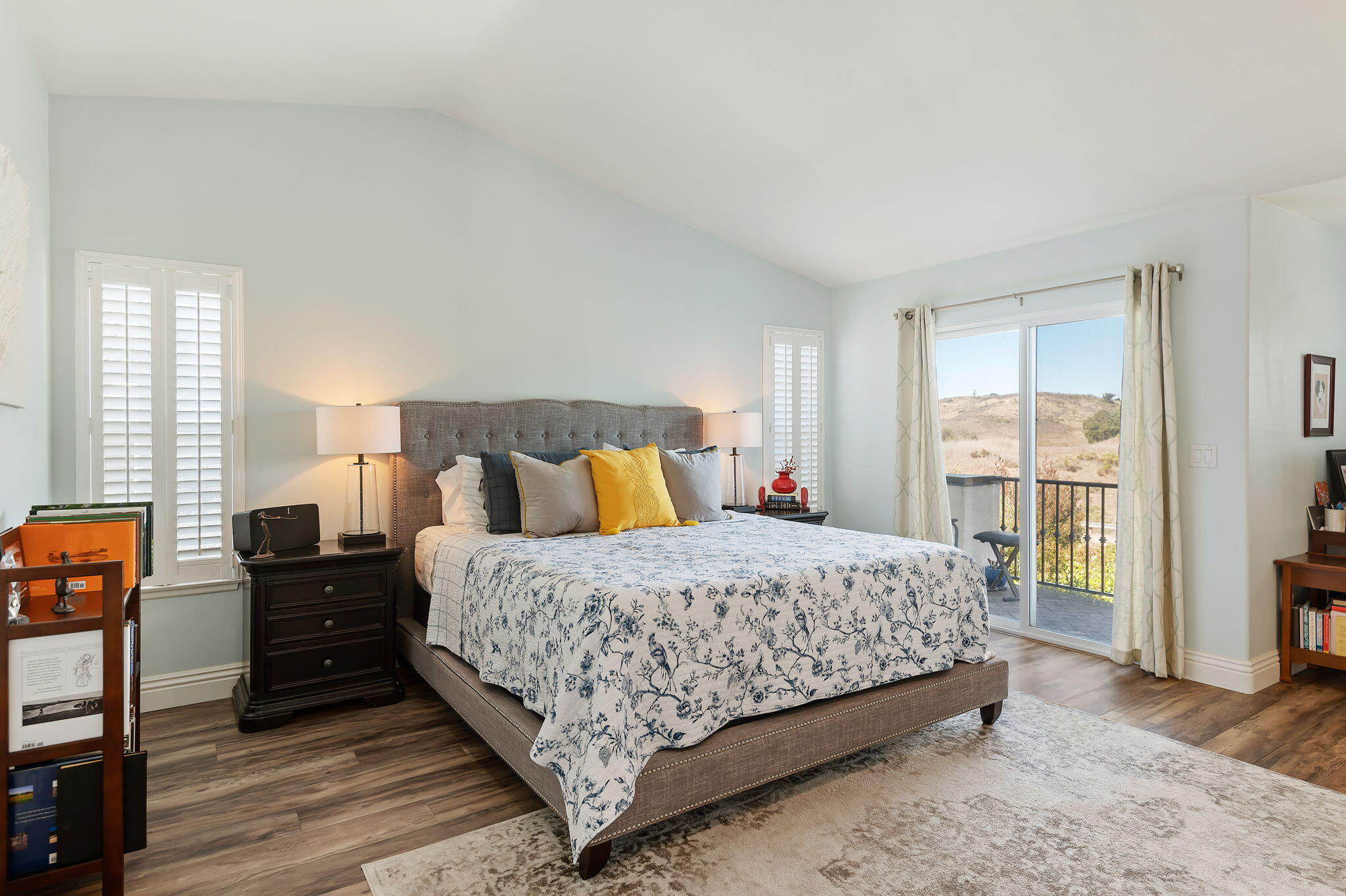 7818 Day Road Goleta, CA 93117 - Photo 14 of 24 a bedroom with a bed and wooden floor