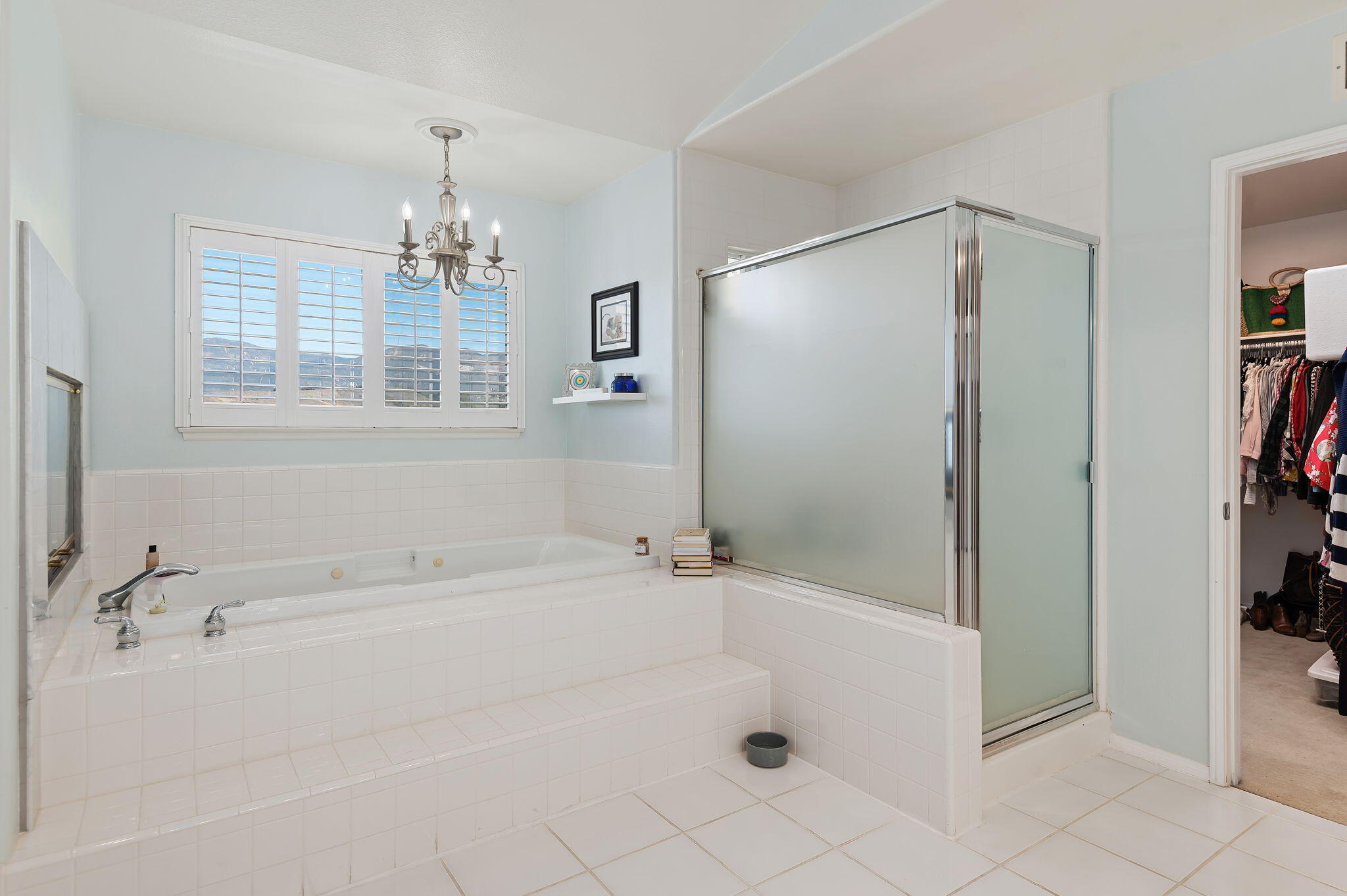 7818 Day Road Goleta, CA 93117 - Photo 16 of 24 a bathroom with a bathtub and a shower