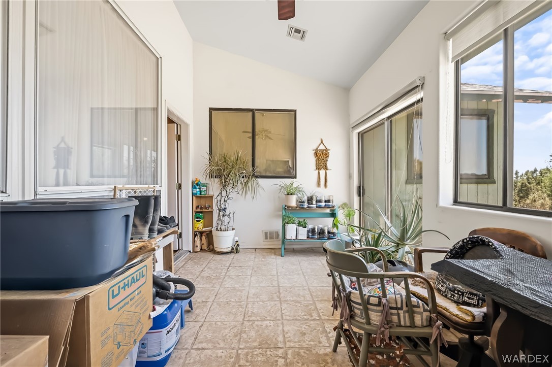 2401 North Stephan Road Kingman, AZ 86401 - Photo 61 of 92 a view of a dining room with furniture window and outside view