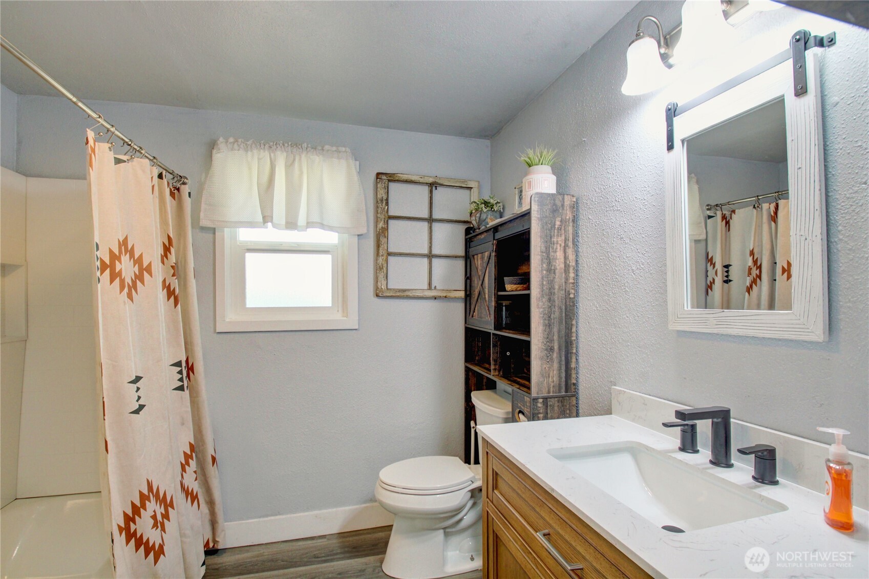 16027 West Division Street Mount Vernon, WA 98273 - Photo 15 of 36 a bathroom with a sink toilet and shower