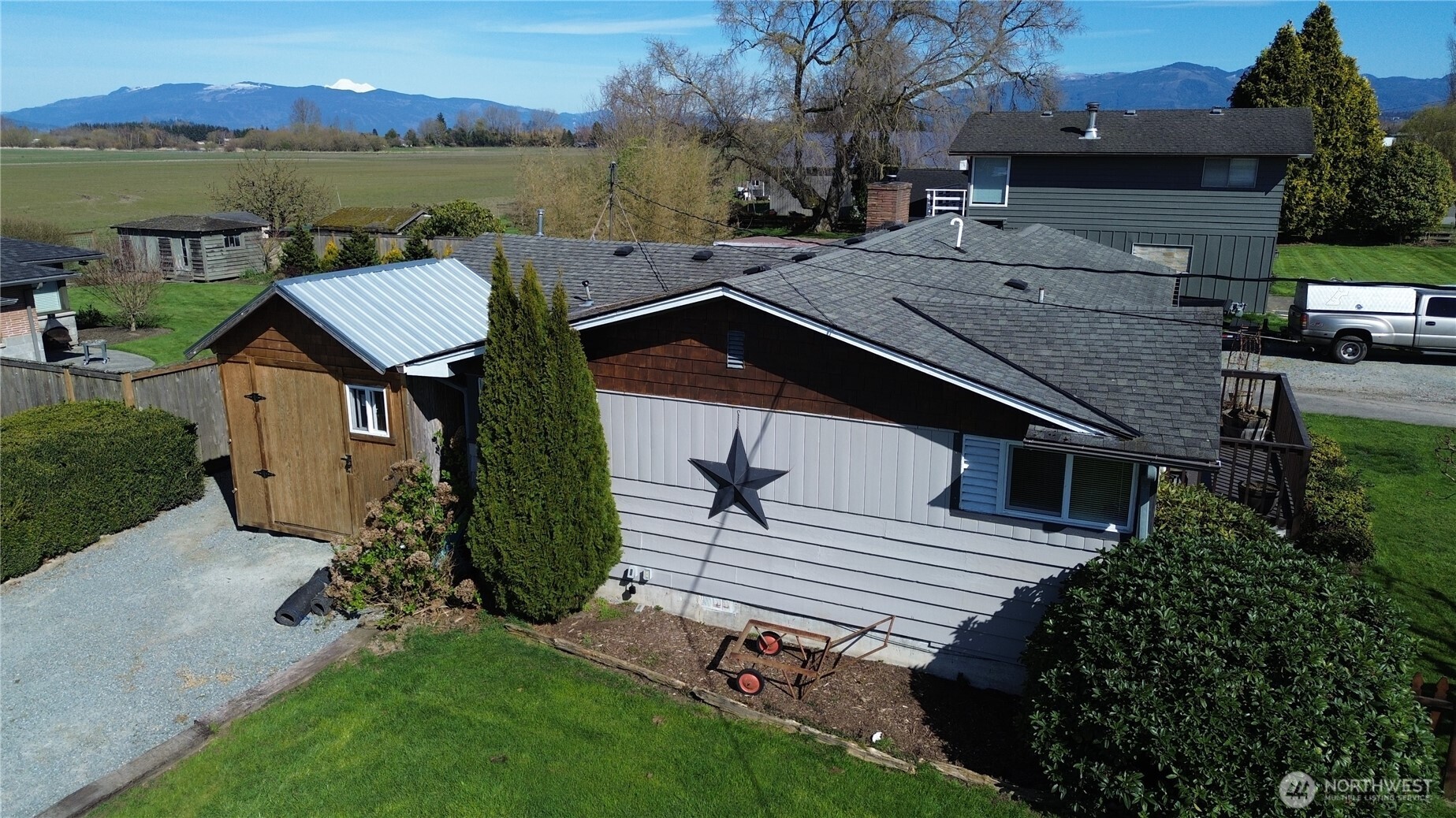 16027 West Division Street Mount Vernon, WA 98273 - Photo 27 of 36 a view of a house with a yard from a terrace