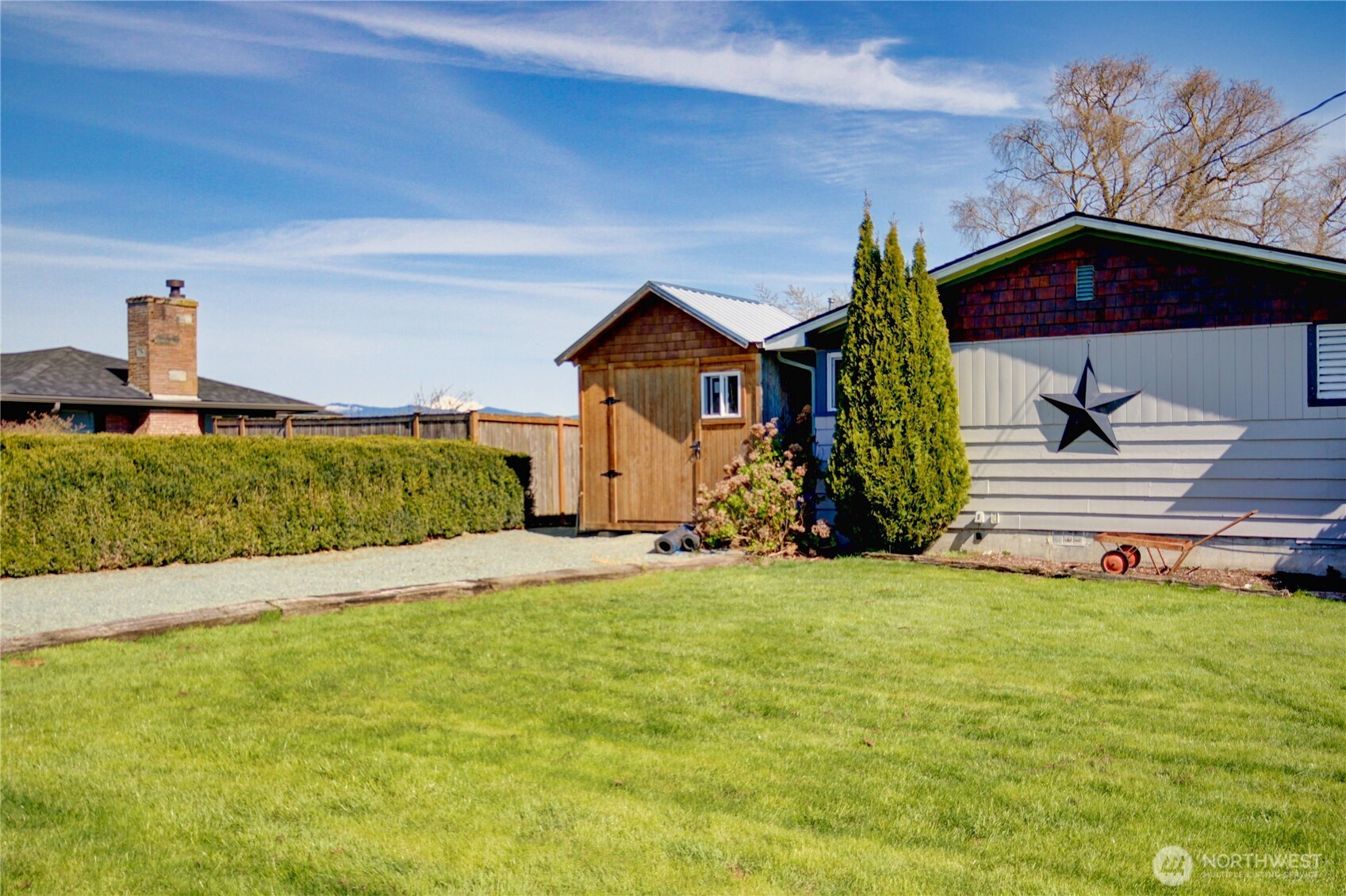16027 West Division Street Mount Vernon, WA 98273 - Photo 28 of 36 a front view of a house with a yard