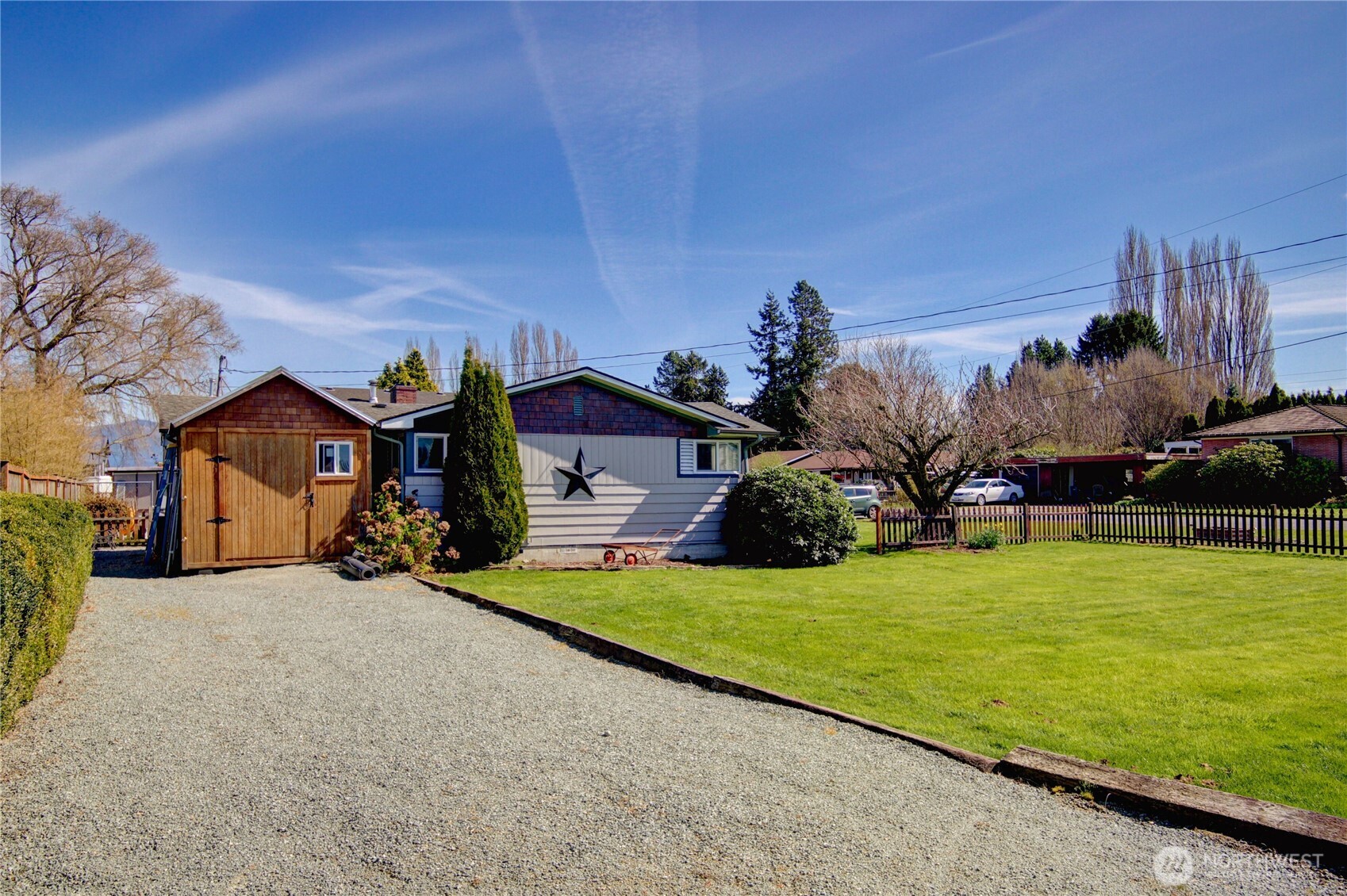16027 West Division Street Mount Vernon, WA 98273 - Photo 29 of 36 a view of a house with yard and garage
