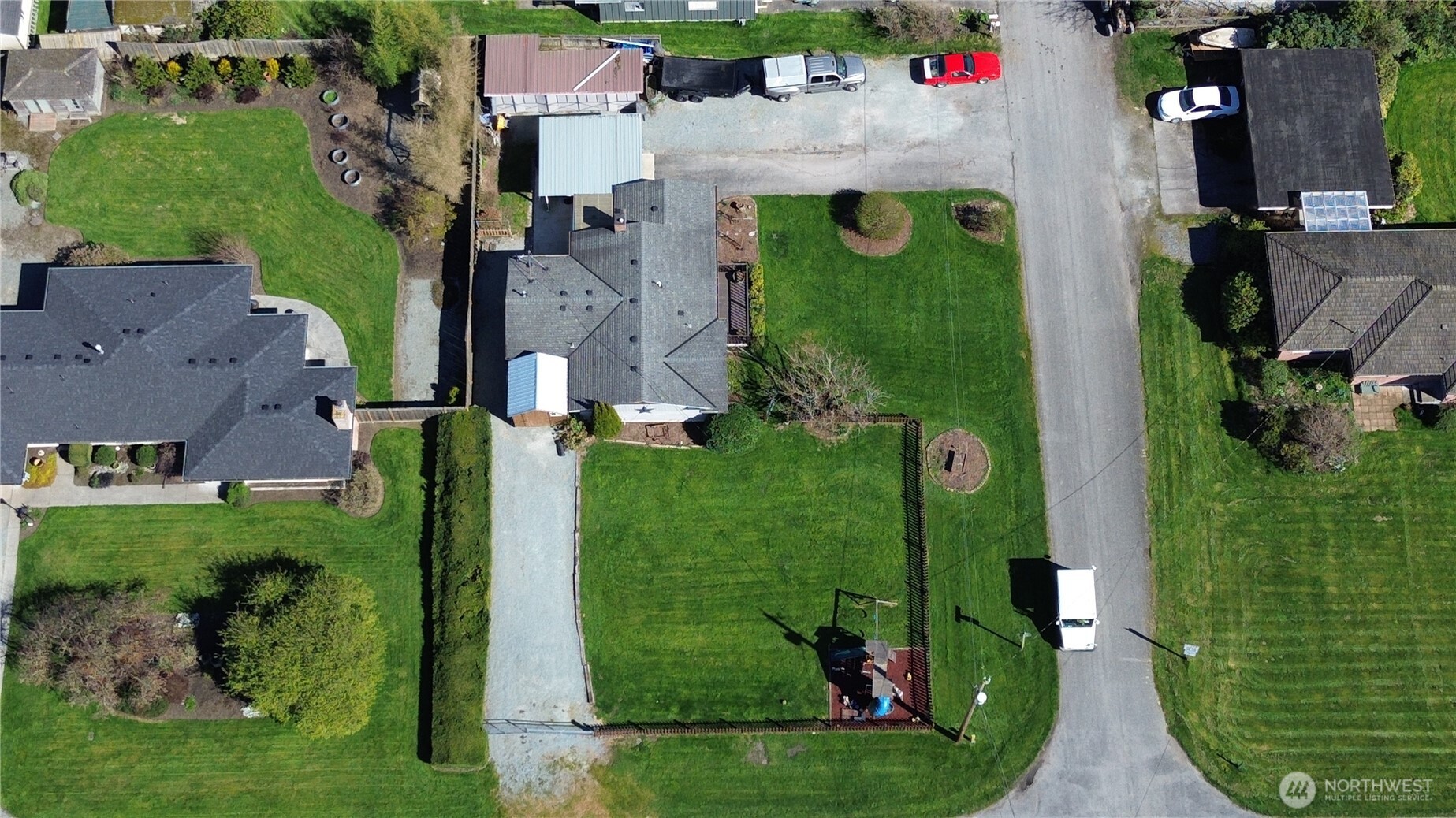 16027 West Division Street Mount Vernon, WA 98273 - Photo 36 of 36 an aerial view of multiple houses with outdoor space
