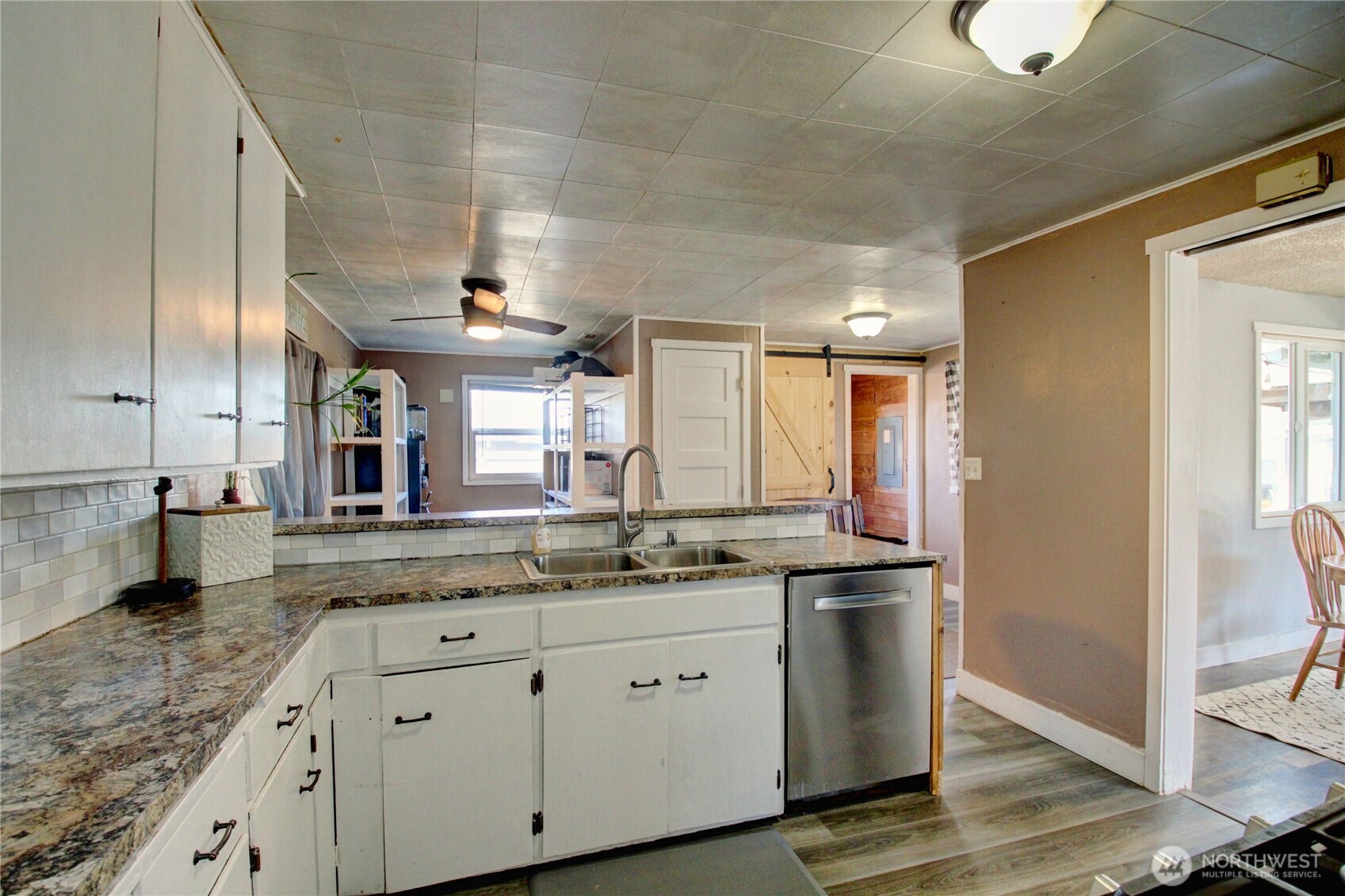 16027 West Division Street Mount Vernon, WA 98273 - Photo 9 of 36 a kitchen with a sink and cabinets