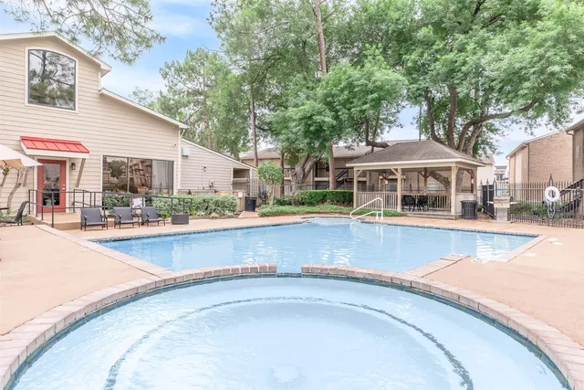 a view of a house with a swimming pool