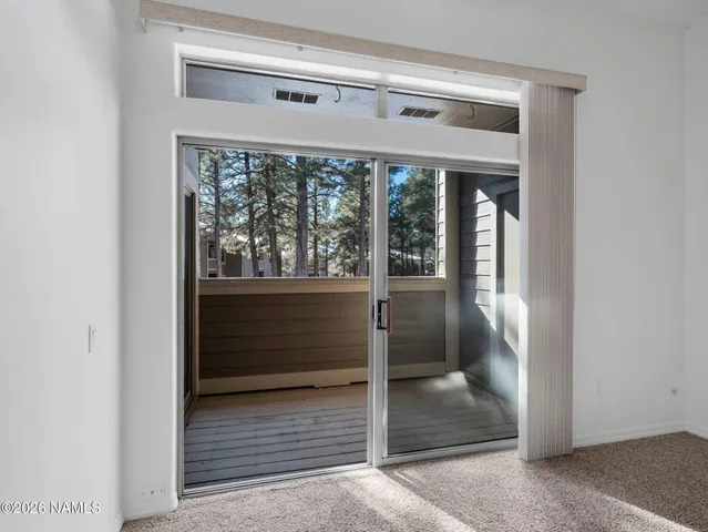 a kitchen with a stove a sink and a refrigerator