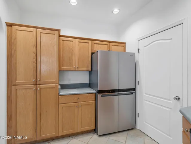 a view of a room with racks on the wall