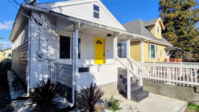 a view of the house with a patio