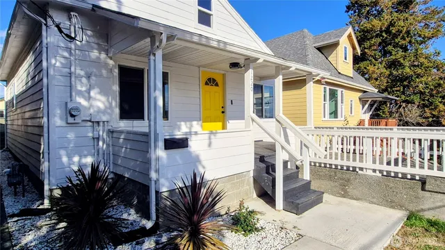 a view of a house with wooden floor and a potted plant