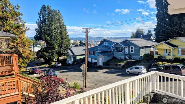 a view of a street with sitting area