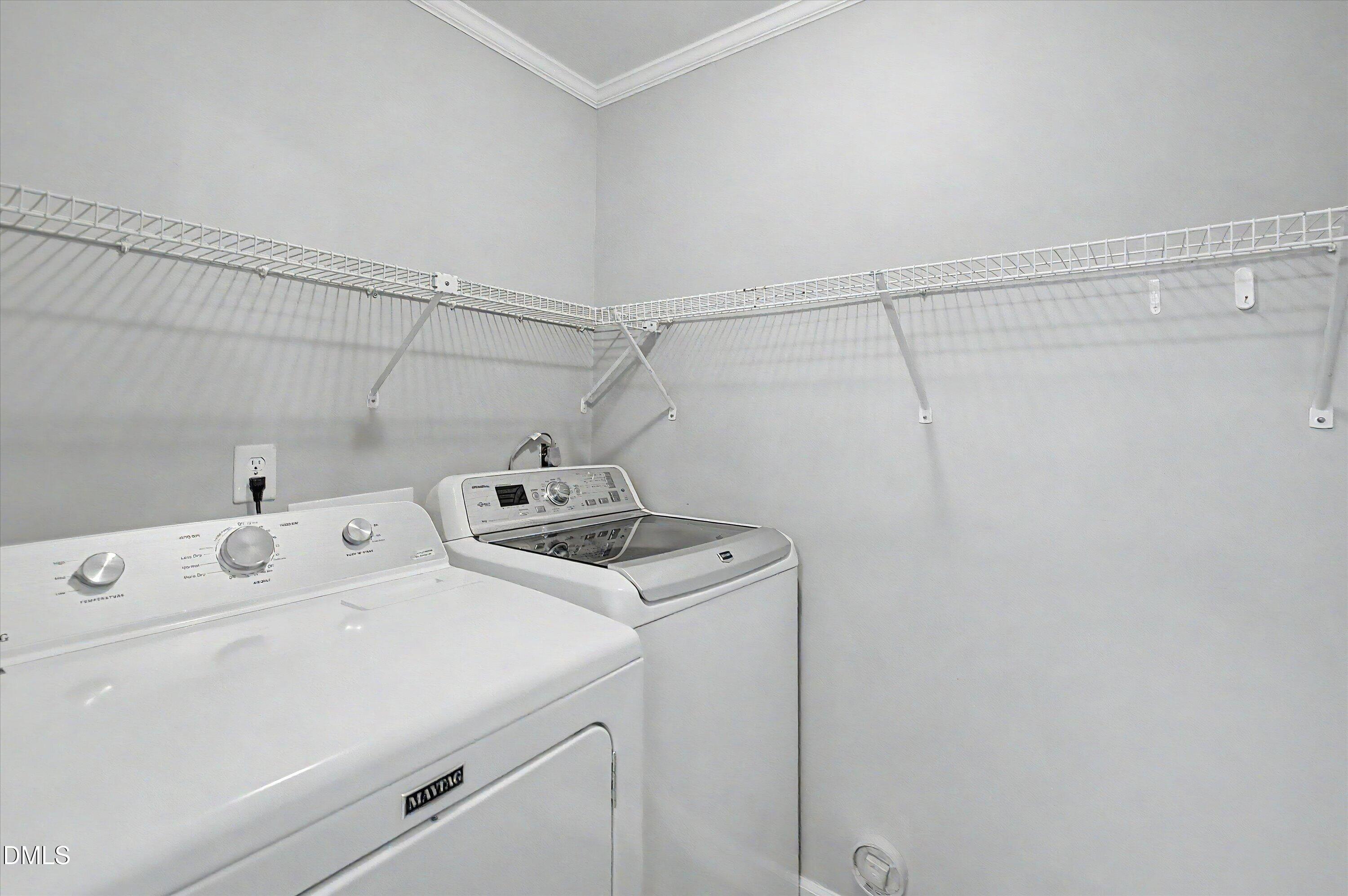 5519 Hamstead Crossing Raleigh, NC 27612 - Photo 17 of 33 a utility room with dryer and washer