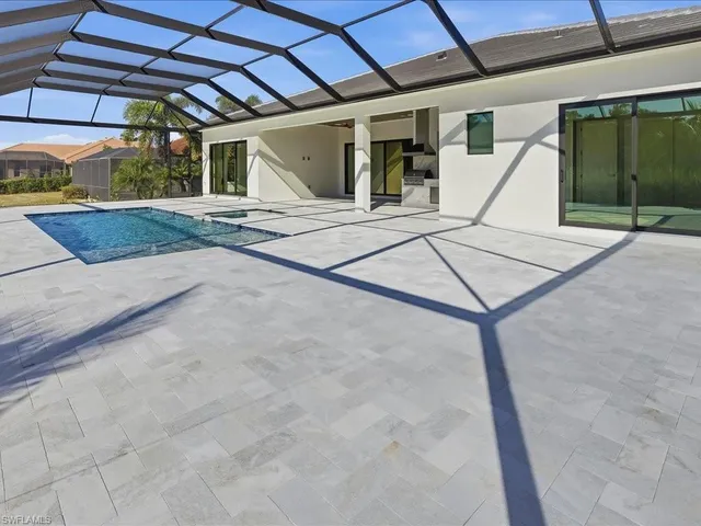 a view of a yard with furniture and a yard