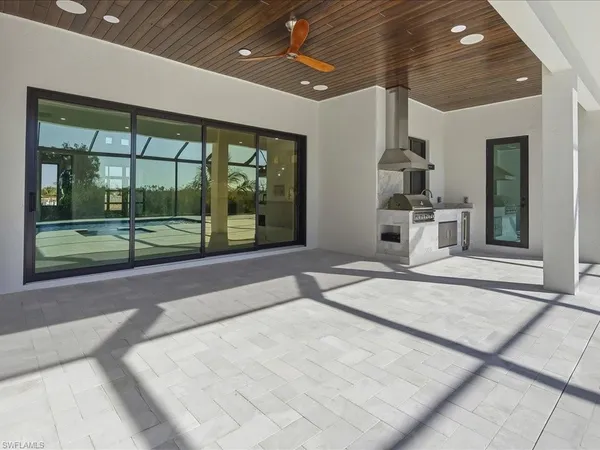 a view of a backyard of the house