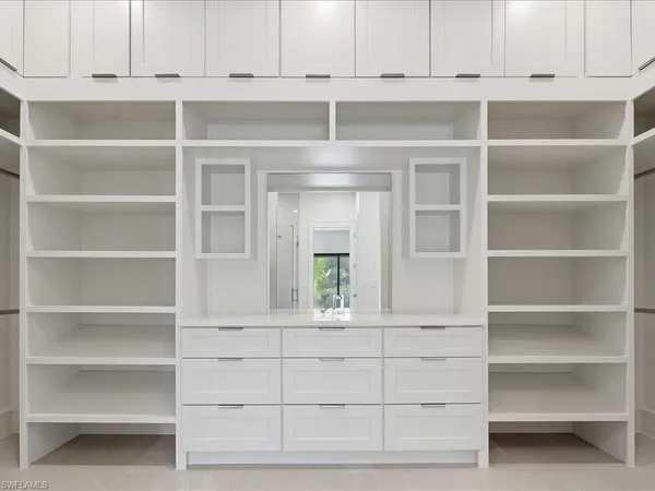 a bathroom with a white tub shower
