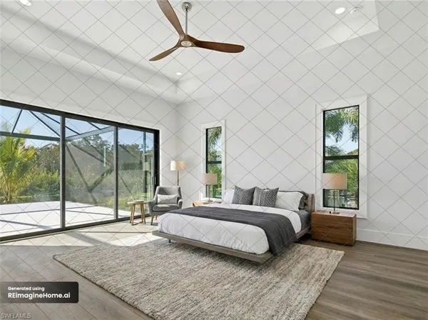 a bedroom with a bed and a large window