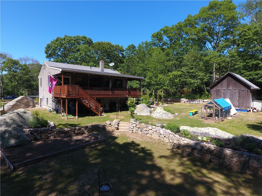 71 Buckeye Brook Road Charlestown, RI 02813 - Photo 2 of 39 Enjoy the out of doors on this oversized deck