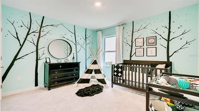 a view of entryway with wooden floor and a sink