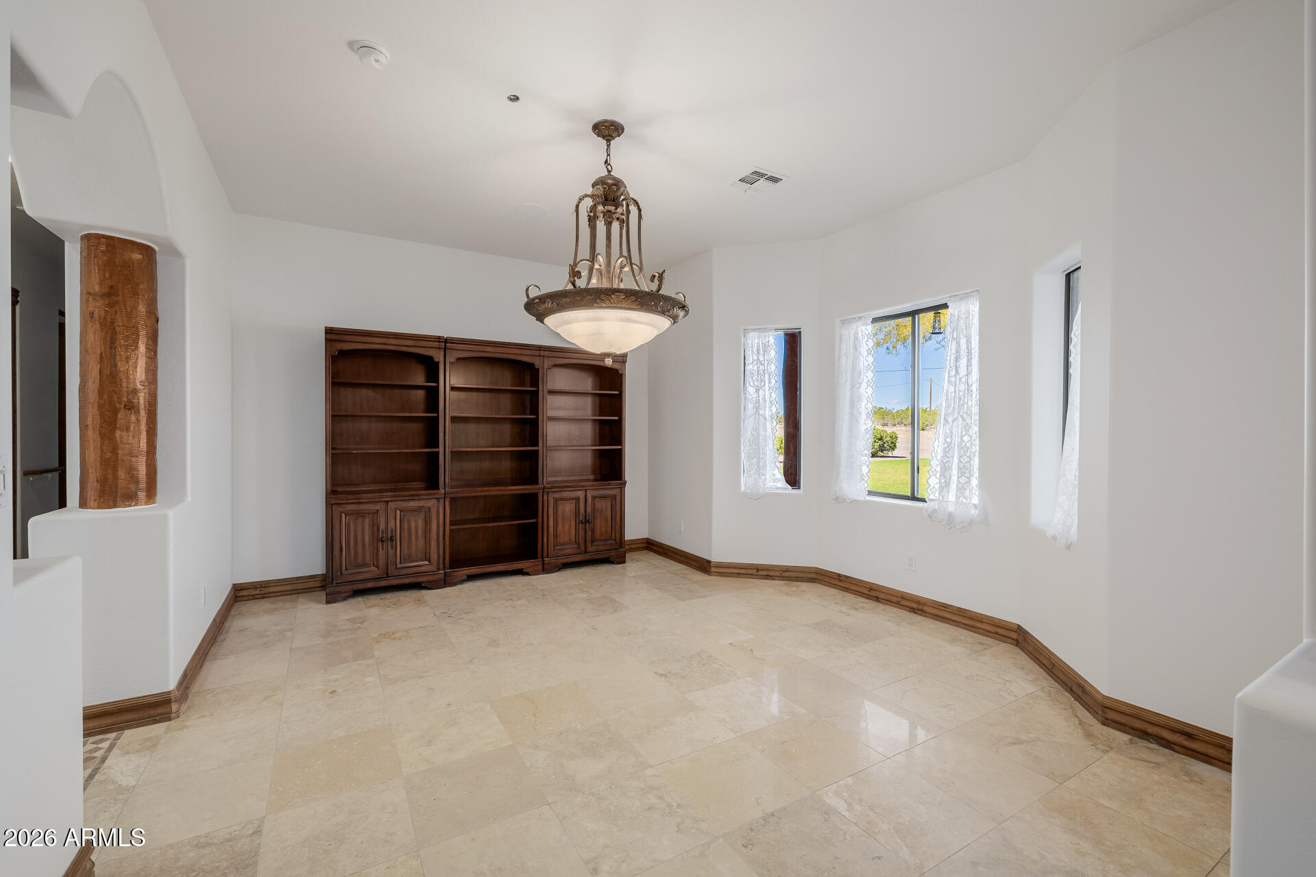 1815 West Maddock Road Phoenix, AZ 85086 - Photo 11 of 71 a view of an empty room with a window