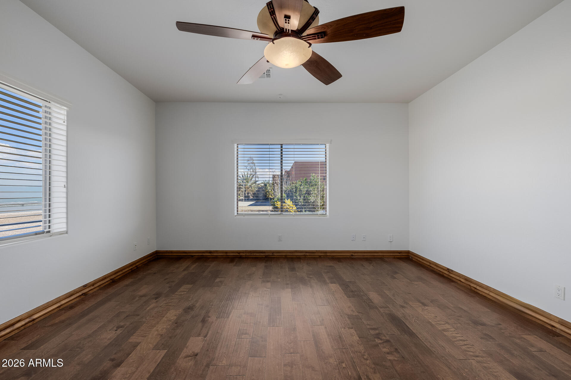 1815 West Maddock Road Phoenix, AZ 85086 - Photo 17 of 71 wooden floor in an empty room with a window