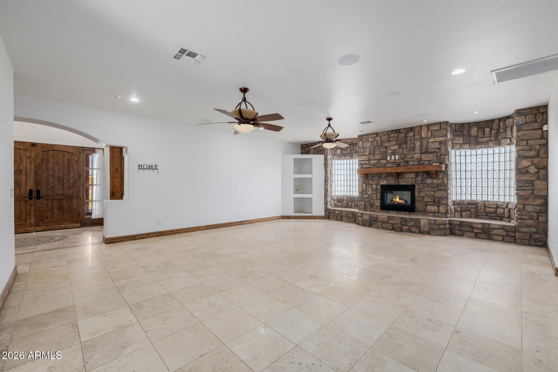 1815 West Maddock Road Phoenix, AZ 85086 - Photo 20 of 71 a view of empty room with a fireplace