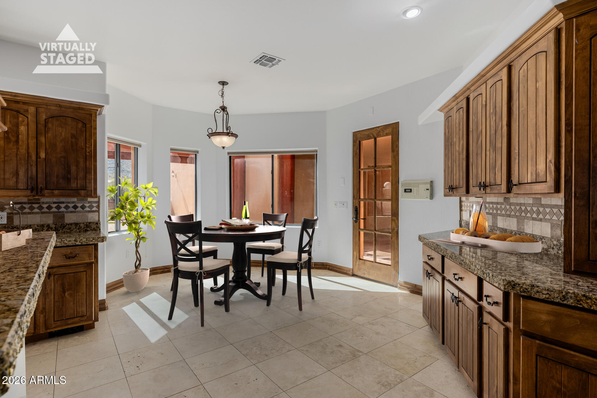 1815 West Maddock Road Phoenix, AZ 85086 - Photo 24 of 71 a view of a dining room with furniture window and outside view