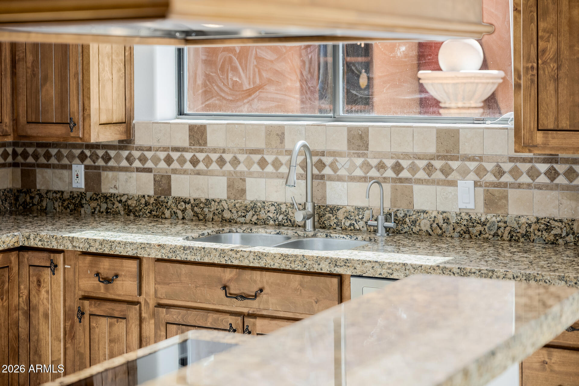 1815 West Maddock Road Phoenix, AZ 85086 - Photo 29 of 71 a bathroom with a granite countertop sink and a mirror