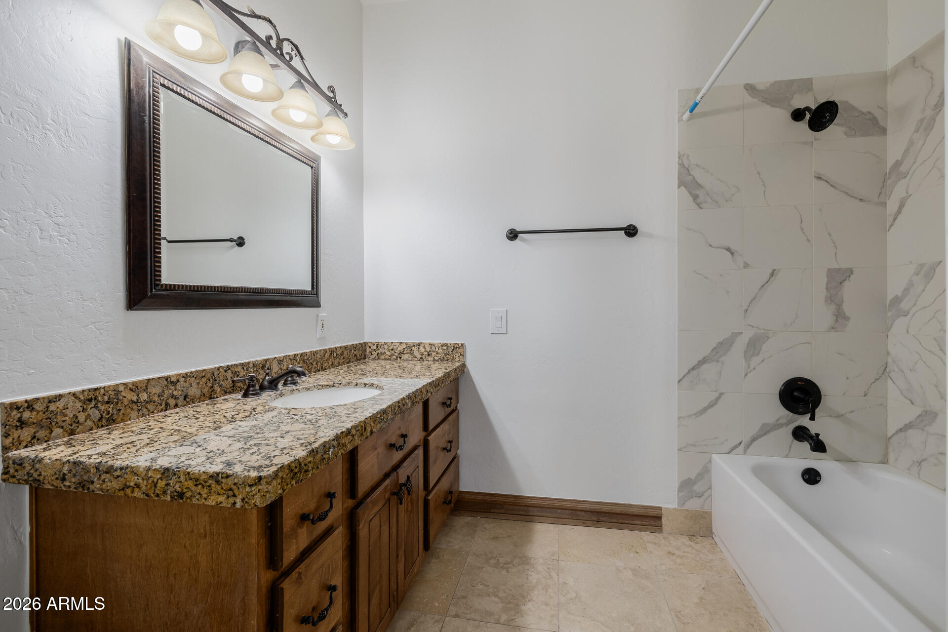 1815 West Maddock Road Phoenix, AZ 85086 - Photo 40 of 71 a bathroom with a granite countertop sink and a mirror