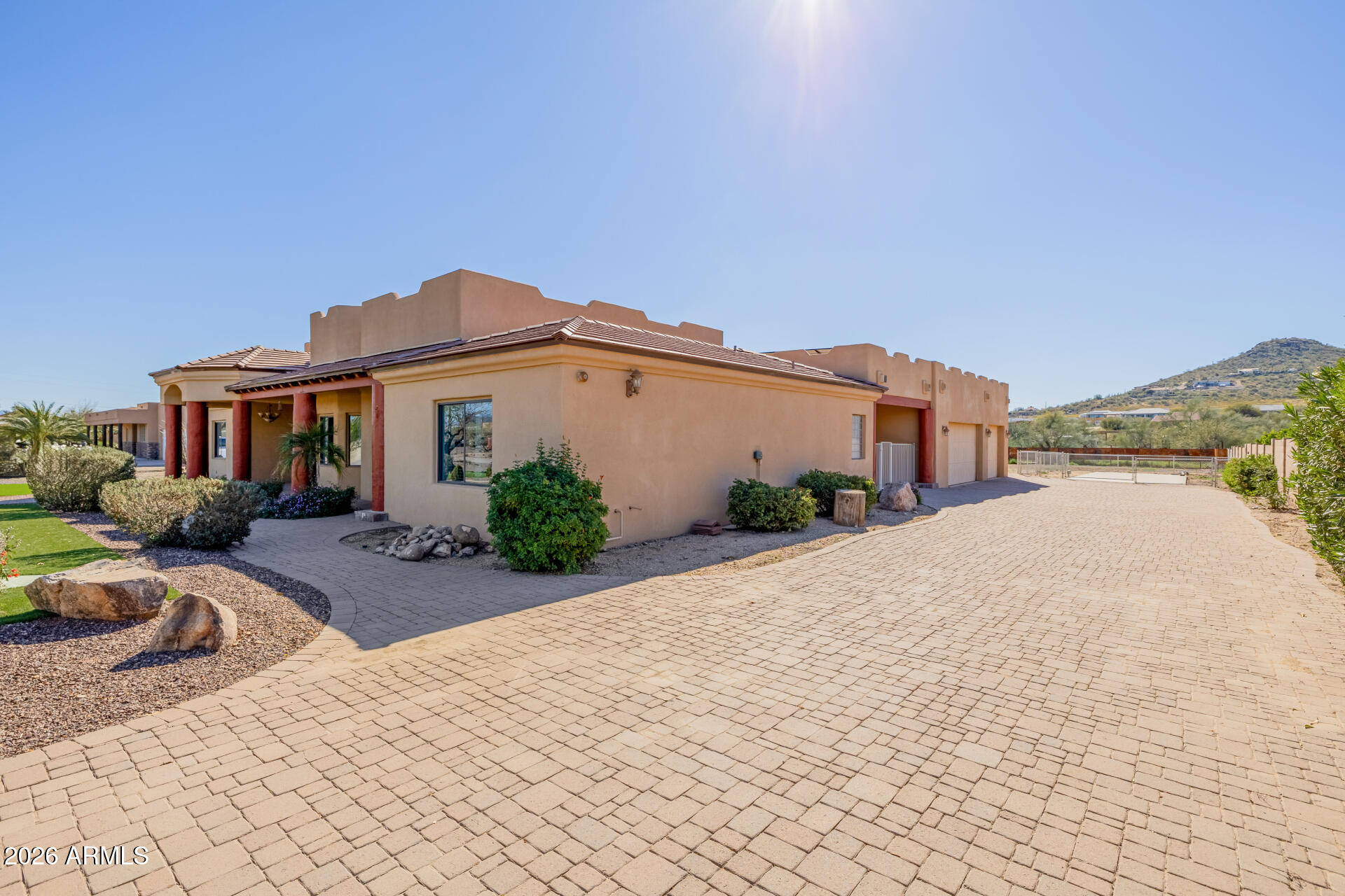 1815 West Maddock Road Phoenix, AZ 85086 - Photo 4 of 71 a front view of a house with a yard and garage