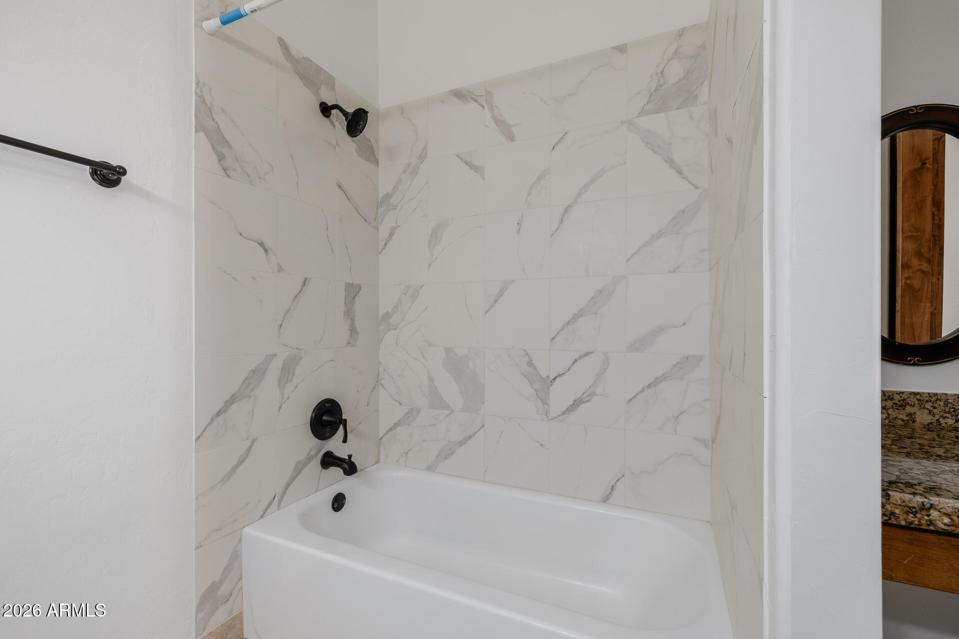 1815 West Maddock Road Phoenix, AZ 85086 - Photo 41 of 71 a bathroom with a bathtub