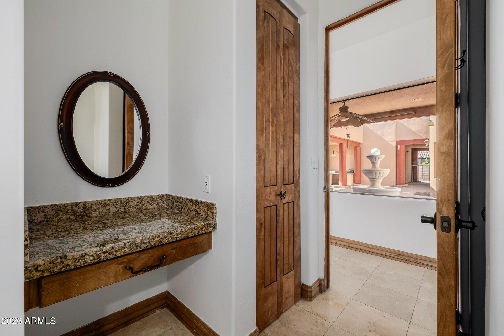 1815 West Maddock Road Phoenix, AZ 85086 - Photo 42 of 71 a bathroom with a granite countertop sink a mirror and a shower