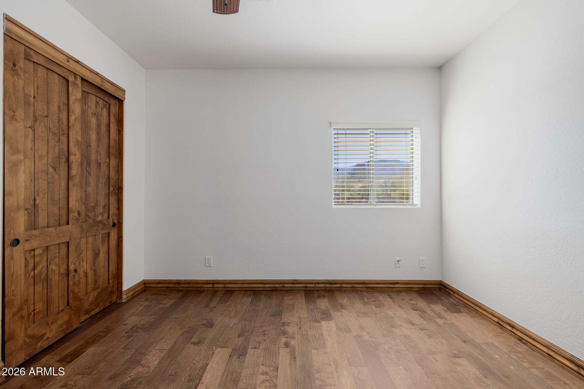 1815 West Maddock Road Phoenix, AZ 85086 - Photo 46 of 71 an empty room with a window