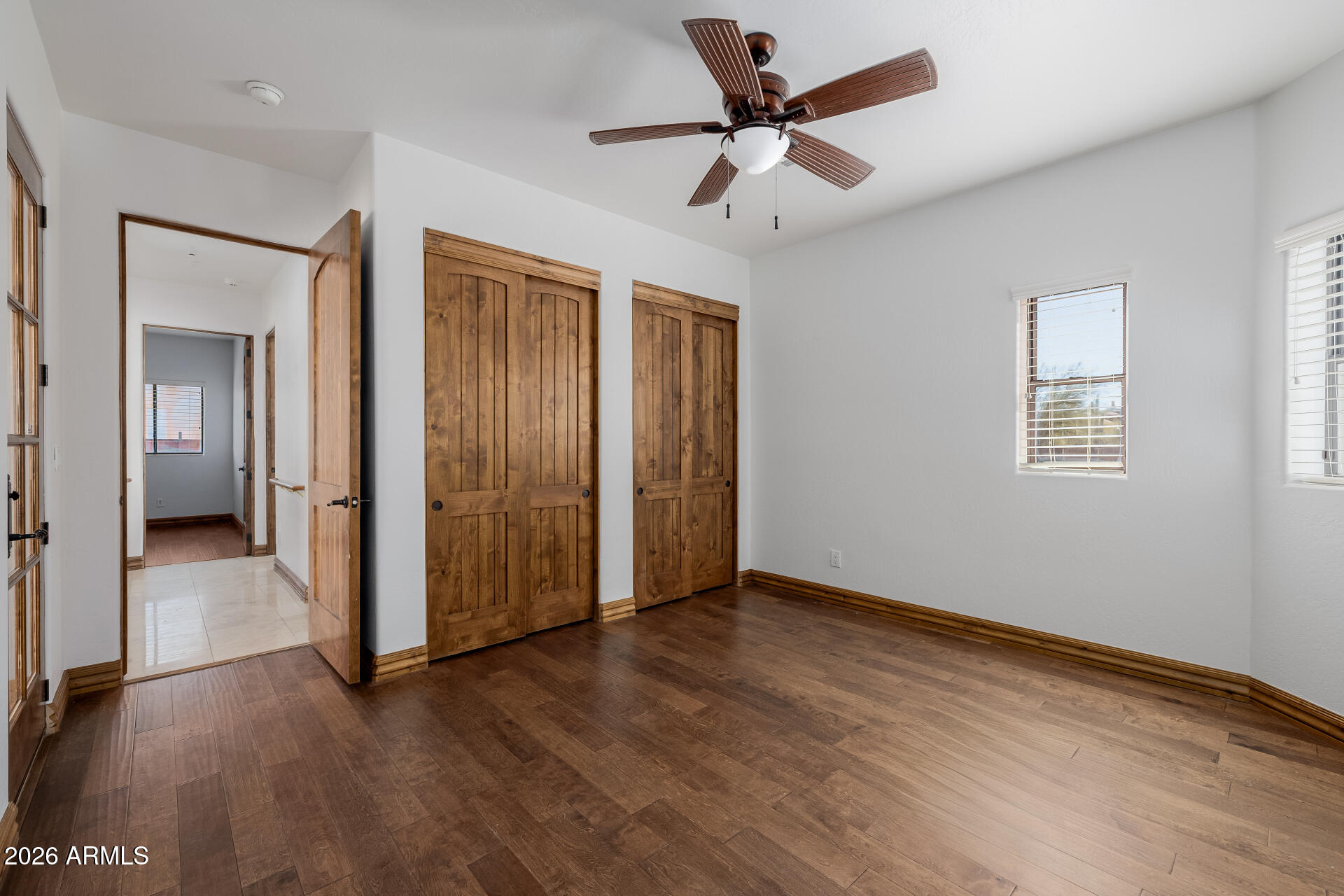1815 West Maddock Road Phoenix, AZ 85086 - Photo 48 of 71 wooden floor in an empty room with a window