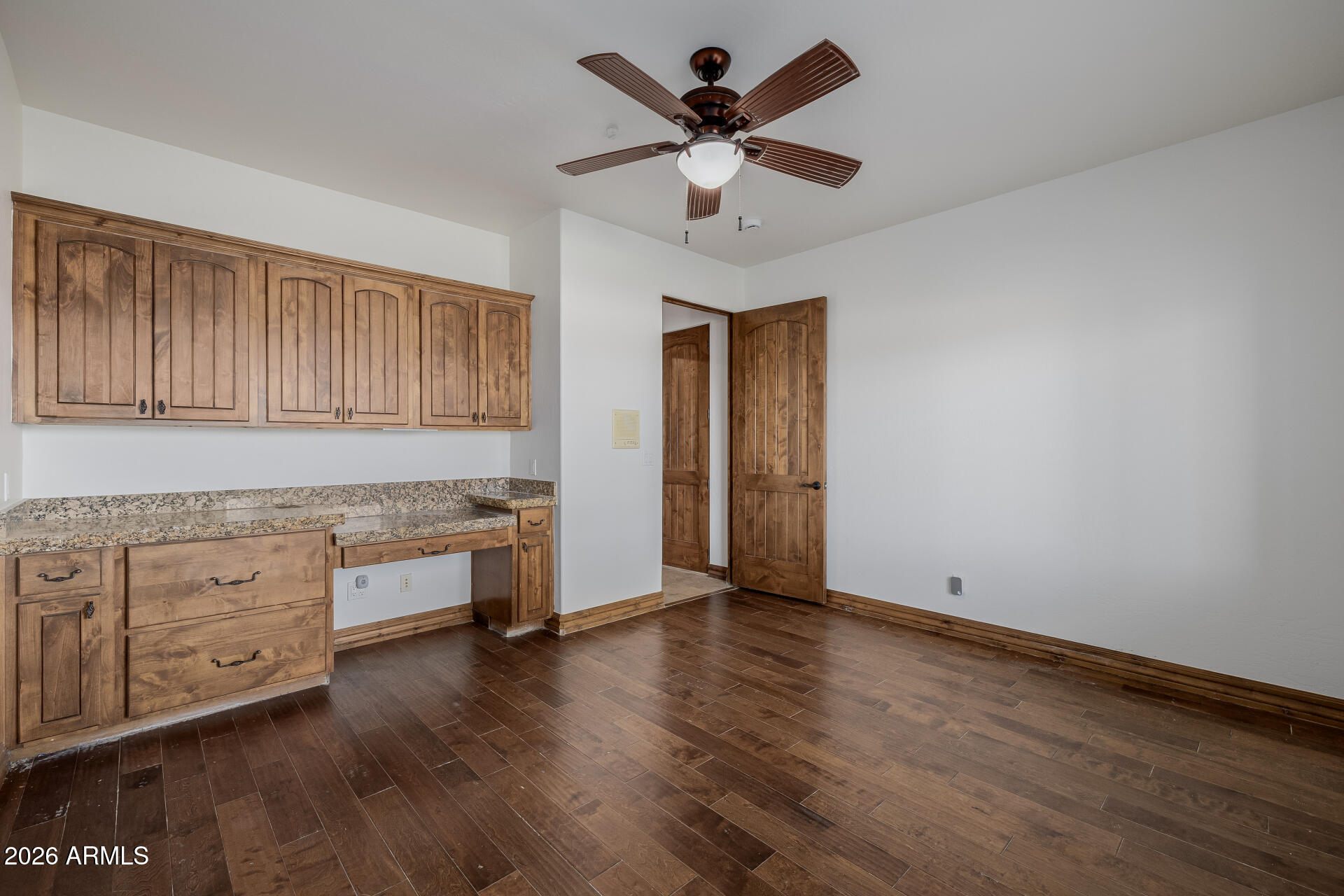 1815 West Maddock Road Phoenix, AZ 85086 - Photo 54 of 71 a living room with stainless steel appliances kitchen island granite countertop wooden floors and view living room