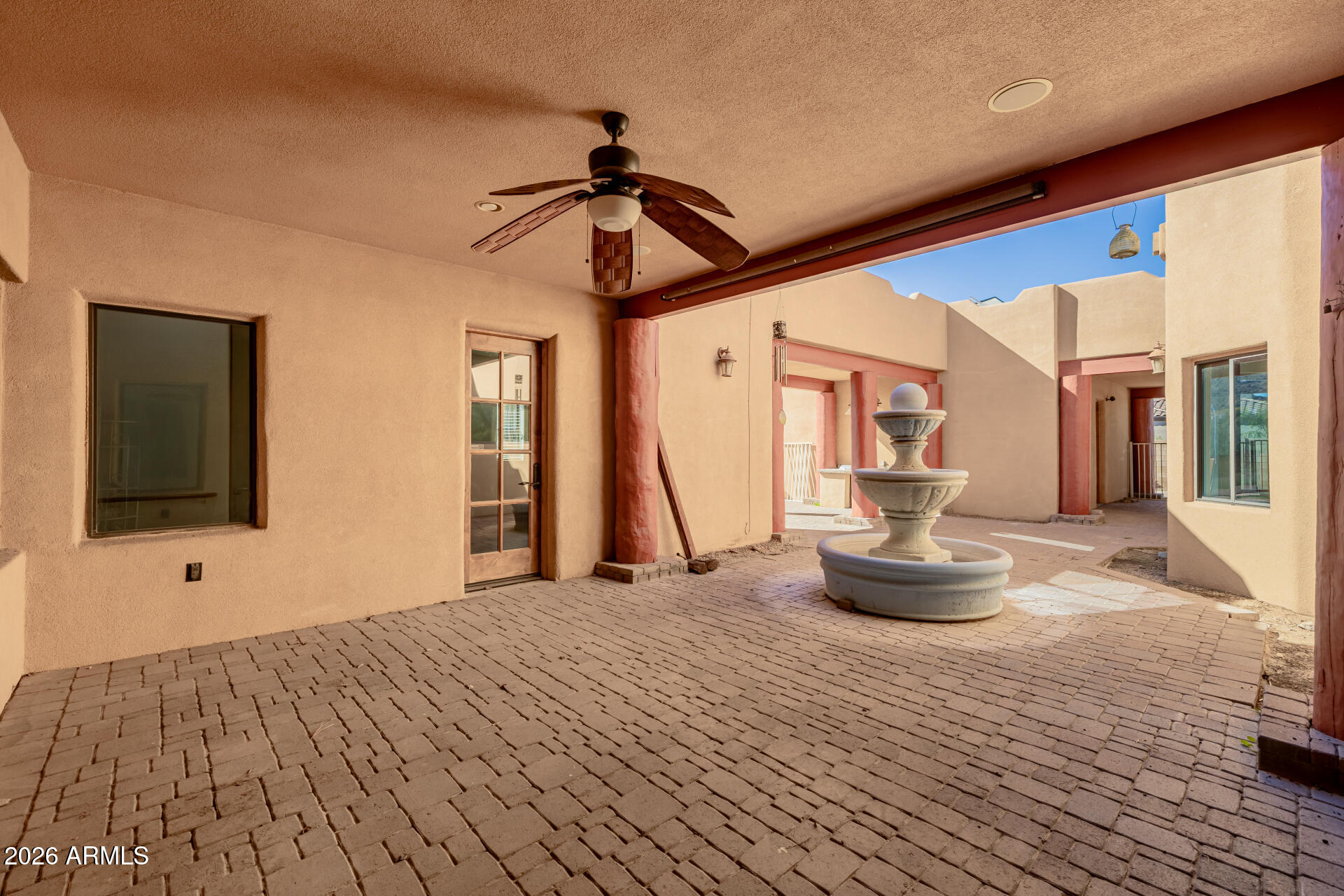 1815 West Maddock Road Phoenix, AZ 85086 - Photo 63 of 71 a bedroom with a bed and a chandelier