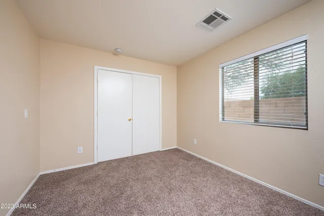 a view of hallway with windows