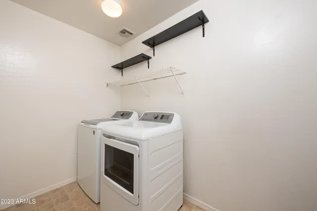 a view of backyard with cabin