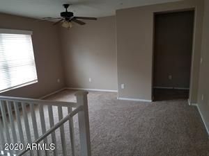952 South Adam Way Gilbert, AZ 85296 - Photo 4 of 8 a view of an empty room and window