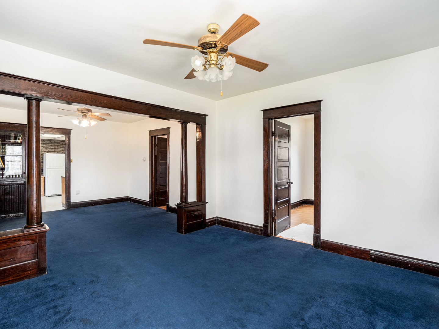 121 Davis Avenue, Unit 1 Rockdale, IL 60436 - Photo 5 of 10 a view of an empty room with a ceiling fan