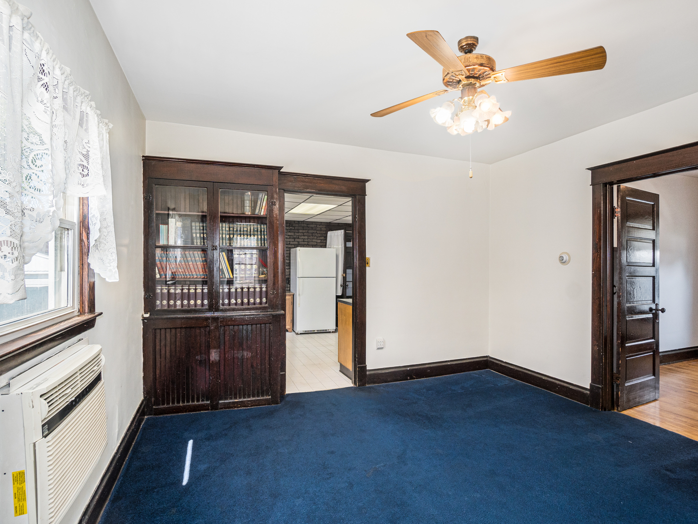 121 Davis Avenue, Unit 1 Rockdale, IL 60436 - Photo 6 of 10 wooden floor in an empty room with a window