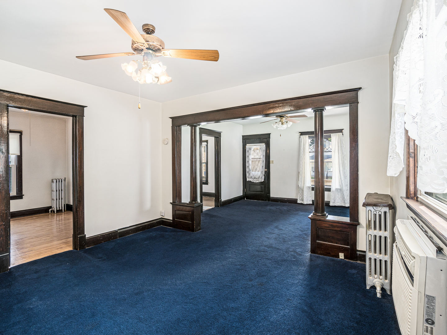 121 Davis Avenue, Unit 1 Rockdale, IL 60436 - Photo 7 of 10 a living room with furniture and a large window