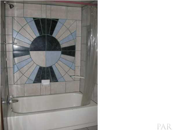 5052 Ridgeway Boulevard Milton, FL 32570 - Photo 9 of 17 Beautiful tile work around Master Bath tub
