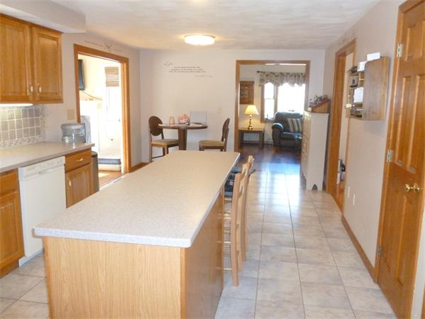 15 Gov Doherty Road Billerica, MA 01821 - Photo 11 of 30 a view of a kitchen from the hallway