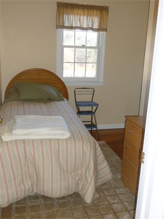15 Gov Doherty Road Billerica, MA 01821 - Photo 26 of 30 a bed sitting in a bedroom next to a window