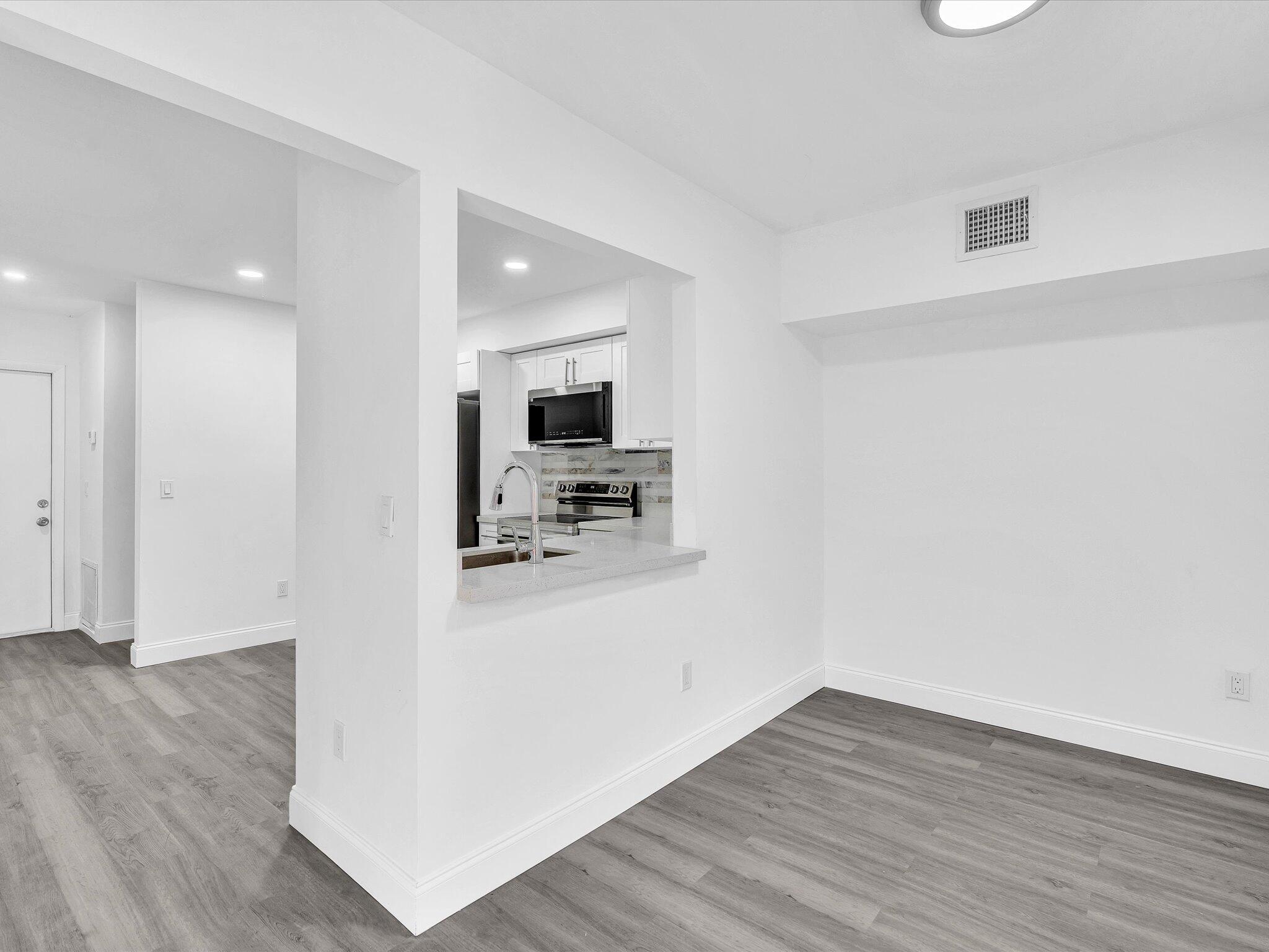 3841 Farragut Street Hollywood, FL 33021 - Photo 13 of 47 a view of kitchen with wooden floor
